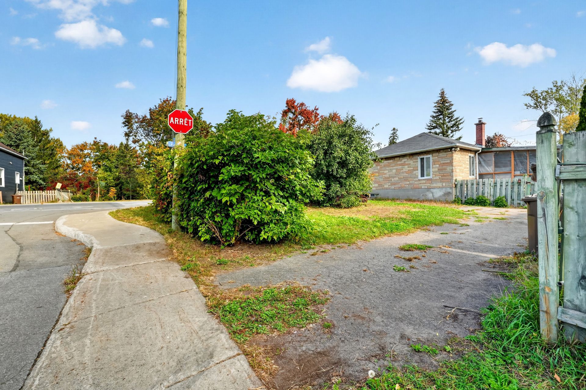Back facade, lot for sale in Laval